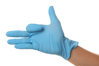 Person in blue latex gloves showing gesture against white background, closeup on hand