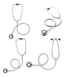 Set with stethoscopes on white background 