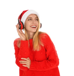 Happy woman with headphones on white background. Christmas music
