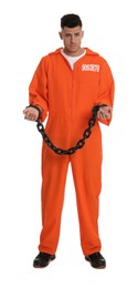 Prisoner in orange jumpsuit with chained hands on white background