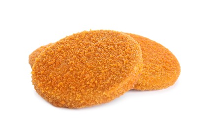 Delicious fried breaded cutlets on white background