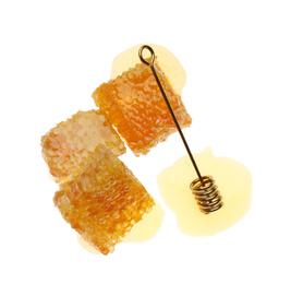 Fresh honeycombs and dipper on white background, top view