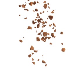Pouring aromatic instant coffee on white background