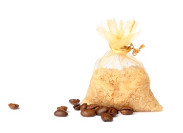 Scented sachet with aroma beads and coffee beans on white background