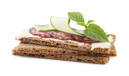 Photo of Fresh rye crispbreads with salami, cream cheese and cucumber on white background