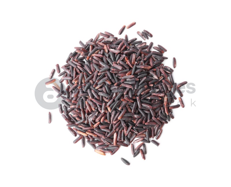 Uncooked organic brown rice isolated on white, top view