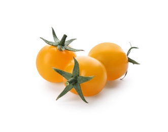 Ripe yellow cherry tomatoes on white background