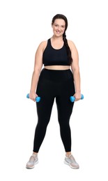 Happy overweight woman with dumbbells on white background