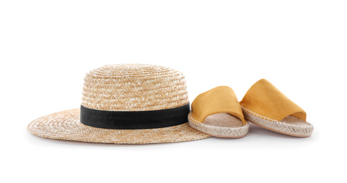 Hat and shoes on white background. Beach objects