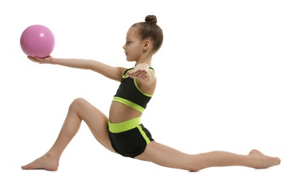 Cute little girl with ball doing gymnastic exercise on white background