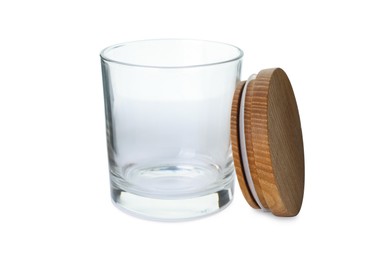 New empty glass jar with wooden lid isolated on white