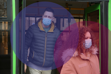 Image of People wearing medical masks coming out from bus. Social distancing during coronavirus outbreak