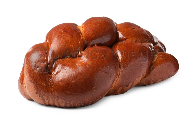 Photo of Homemade braided bread isolated on white. Traditional Shabbat challah