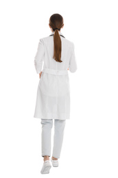 Doctor in robe walking on white background