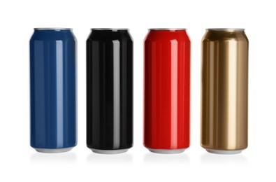 Photo of Set of aluminum cans with drinks on white background