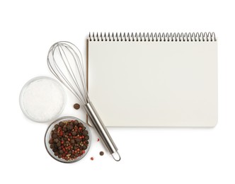 Blank recipe book, spices and whisk on white background, top view. Space for text