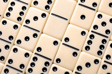 Set of classic domino tiles as background, top view