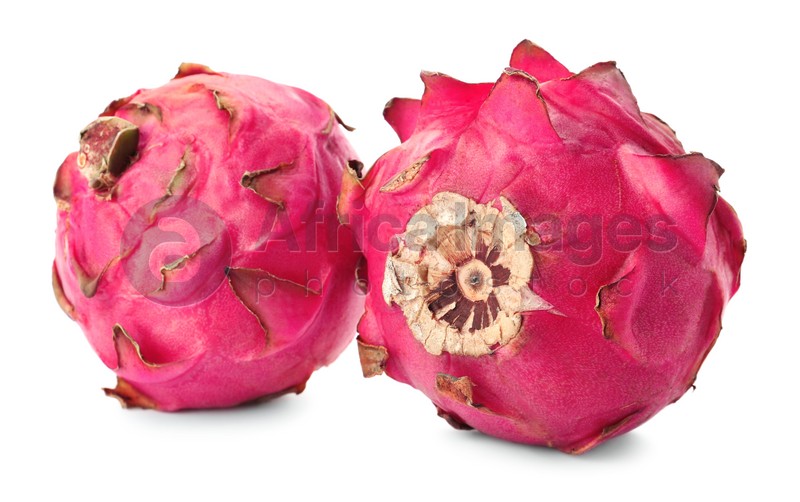 Photo of Delicious pink dragon fruits (pitahaya) on white background