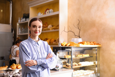 Portrait of female business owner in bakery