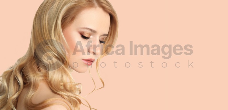 Image of Young woman with beautiful face on light background, space for text. Banner design