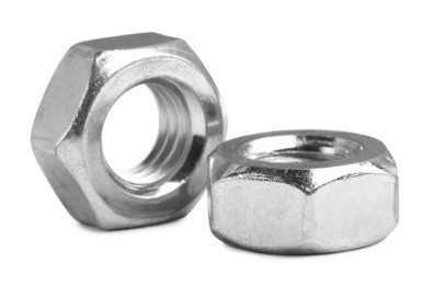 Photo of Two metal hex nuts on white background