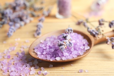 Composition with lavender flowers and natural cosmetic on wooden background