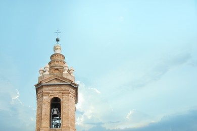 Exterior of beautiful church against blue sky, low angle view