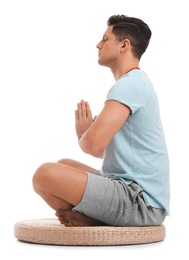 Man meditating on white background. Zen concept