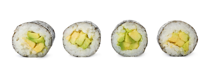 Delicious sushi rolls with avocado on white background