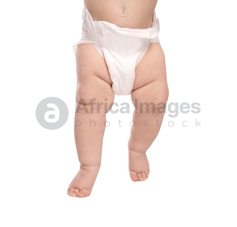 Little baby in diaper on white background, closeup