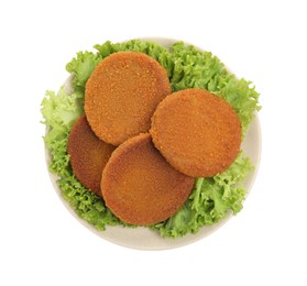 Plate of delicious fried breaded cutlets with lettuce isolated on white, top view