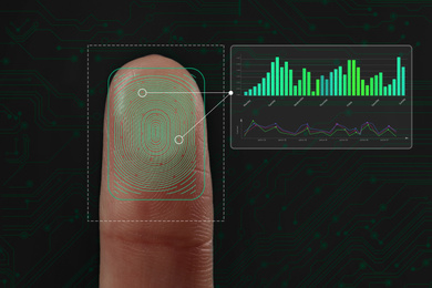 Woman using biometric fingerprint scanner on dark background, closeup
