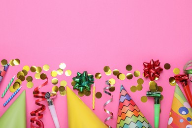 Photo of Flat lay composition with party items on pink background, space for text. Birthday celebration