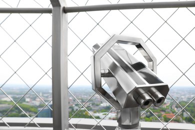 Photo of Metal tower viewer on observation deck, closeup. Space for text