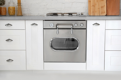 New modern oven in stylish kitchen. Cooking appliance