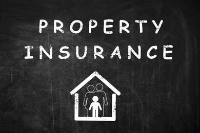 Text Property Insurance and drawing of house with family on chalkboard