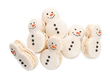 Photo of Beautifully decorated Christmas macarons on white background, top view