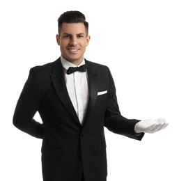 Handsome butler in elegant uniform on white background
