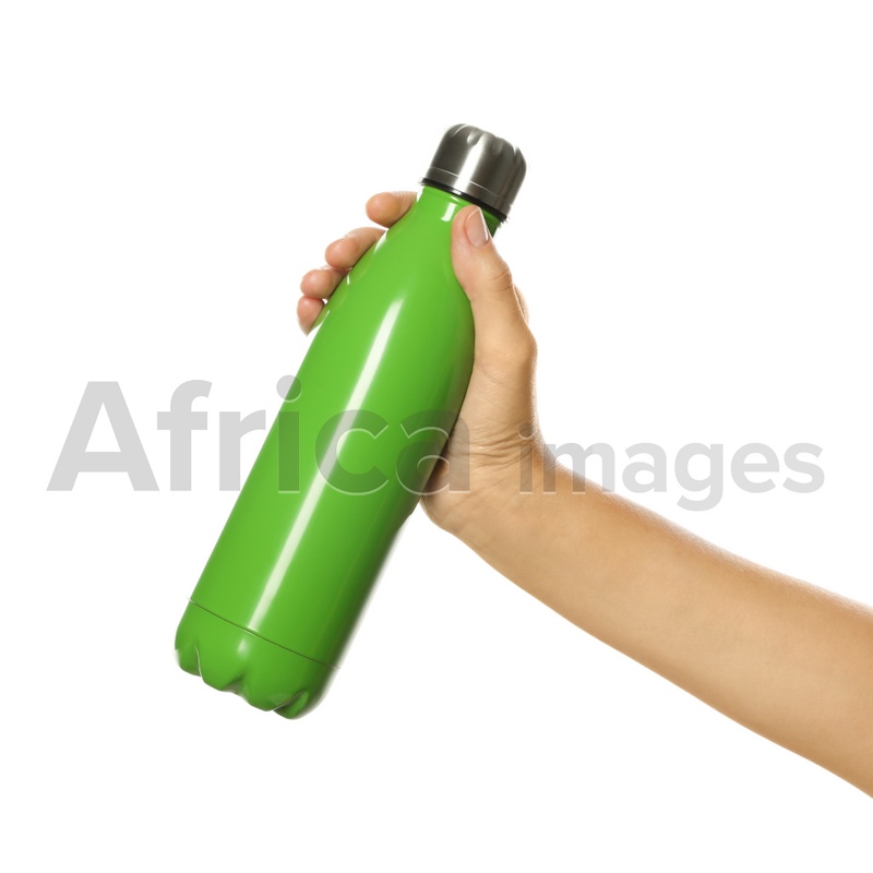 Woman holding green thermos bottle on white background, closeup