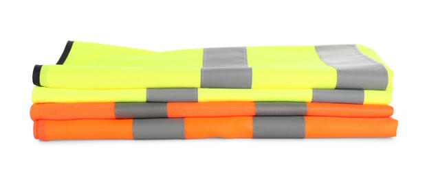 Reflective vests isolated on white. Safety equipment