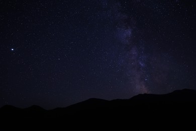 Beautiful view of with starry sky over mountains at night