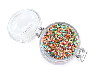Colorful sprinkles in jar on white background, top view. Confectionery decor
