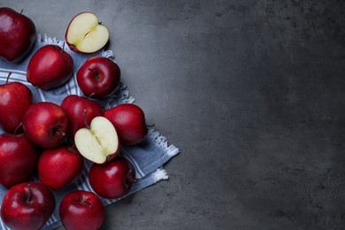 Fresh ripe red apples on grey table, flat lay. Space for text