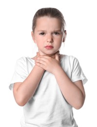 Little girl suffering from sore throat on white background