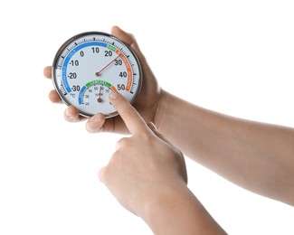 Woman holding dial hygrometer on white background, closeup