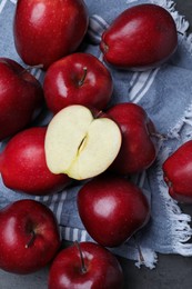 Fresh ripe red apples on grey table, flat lay