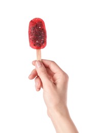 Photo of Woman holding delicious blackberry ice pop on white background, closeup. Fruit popsicle