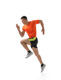 Athletic young man running on white background, side view