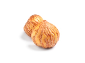 Fresh shelled sweet edible chestnuts on white background