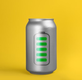 Can of energy drink with picture of fully charged battery on yellow background
